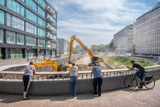 910590 Gezicht op de werkzaamheden ten behoeve van het opnieuw aanleggen van de Stadsbuitengracht te Utrecht, ter ...